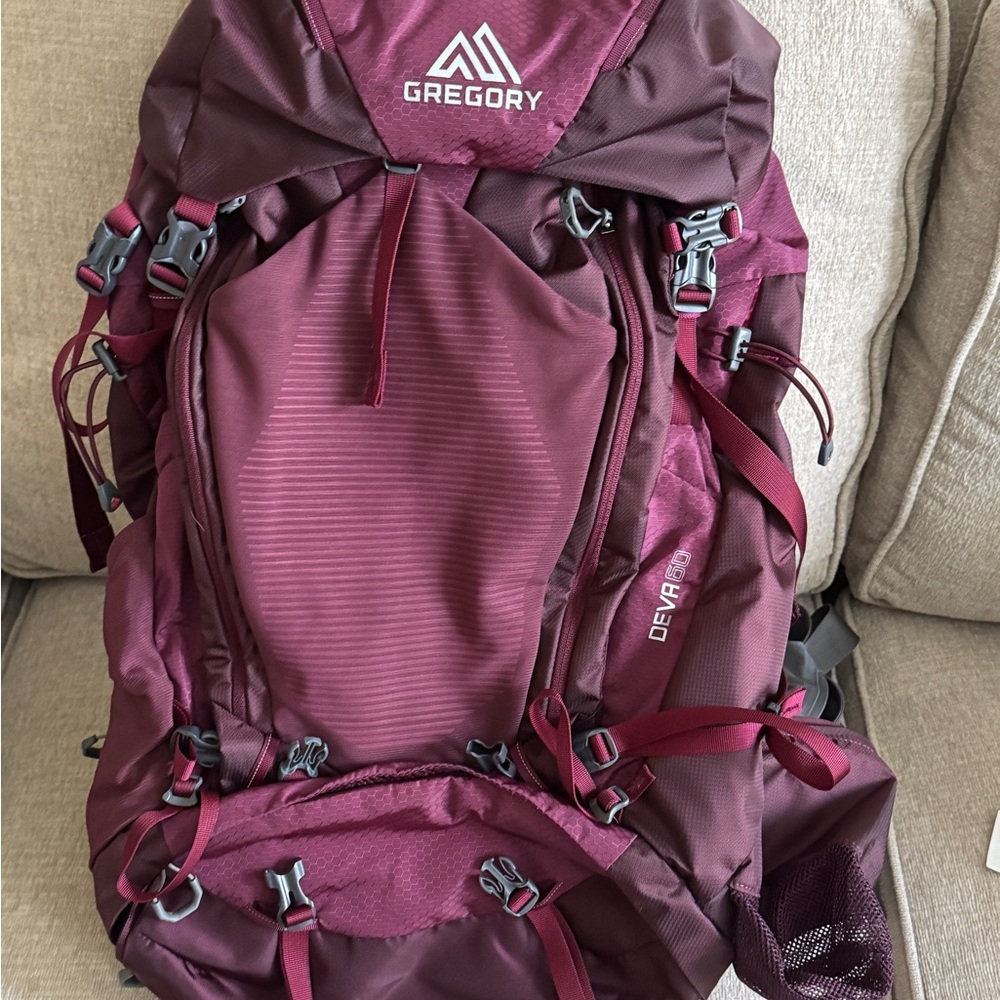 Gregory burgundy hiking backpack with multiple pockets
